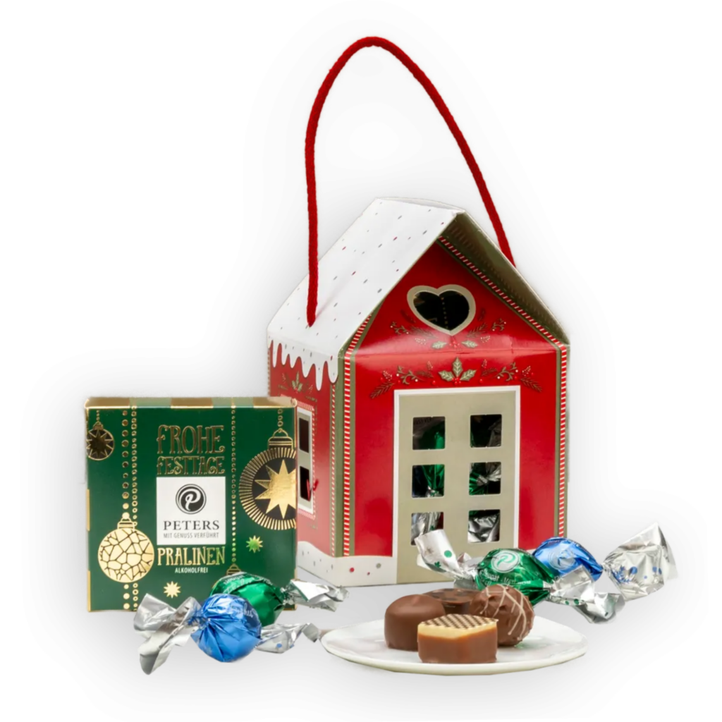 Kleines Weihnachtshäuschen mit Nougat-Pralinen von PETERS